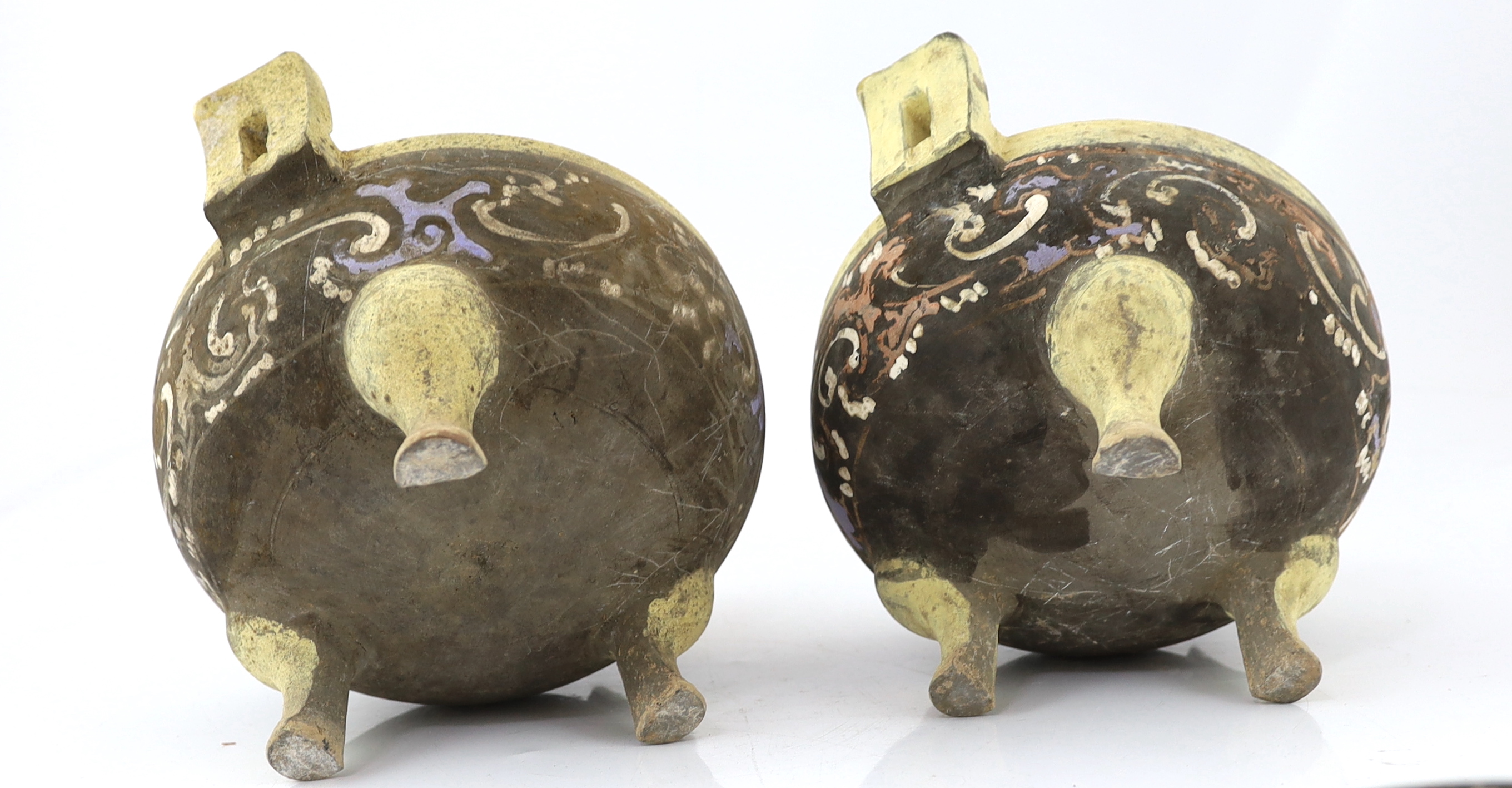 A pair of Chinese polychrome pottery ritual tripod vessels and covers, ding, Han dynasty (202BC - 220AD)